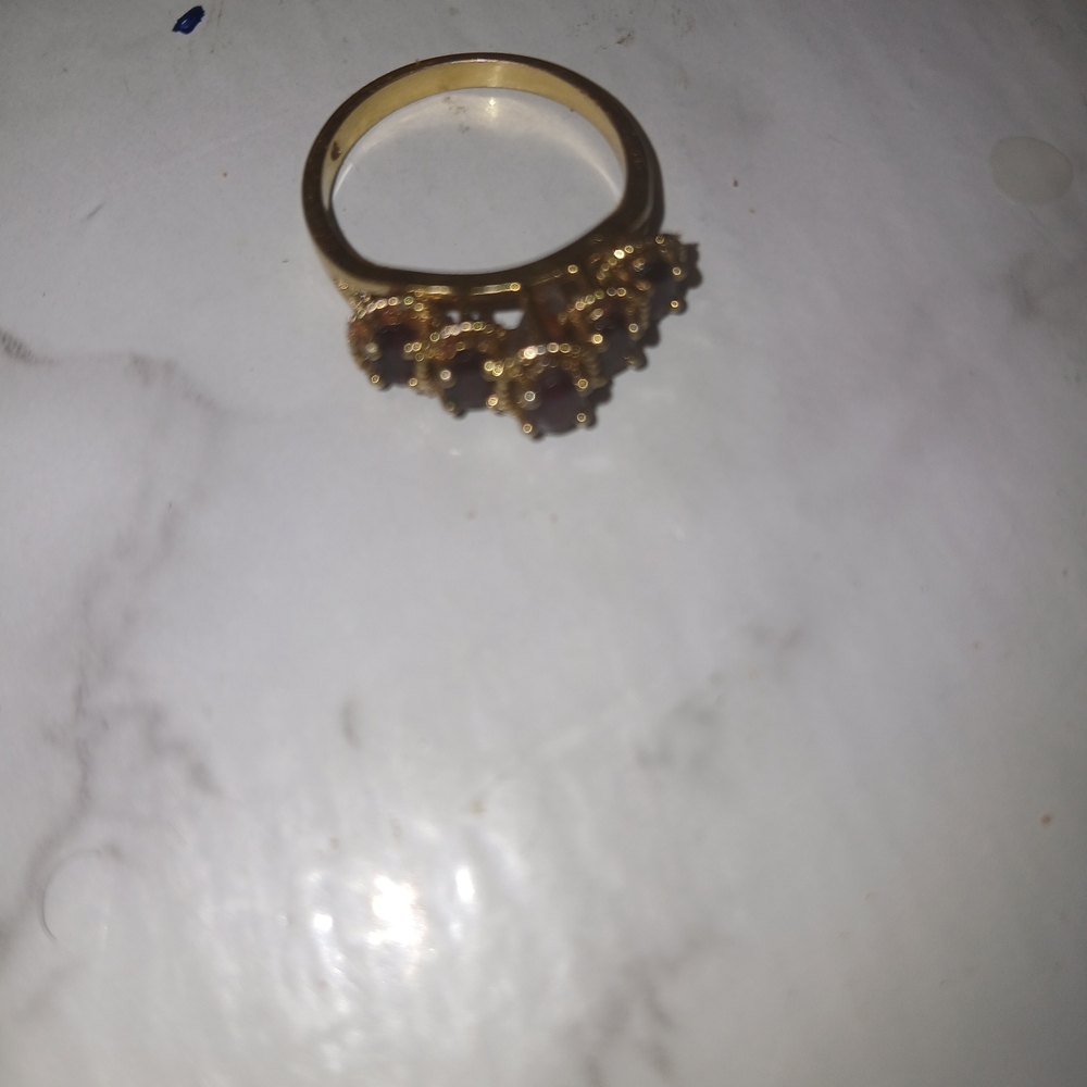 Elegant Gold Ring with Red Gemstones